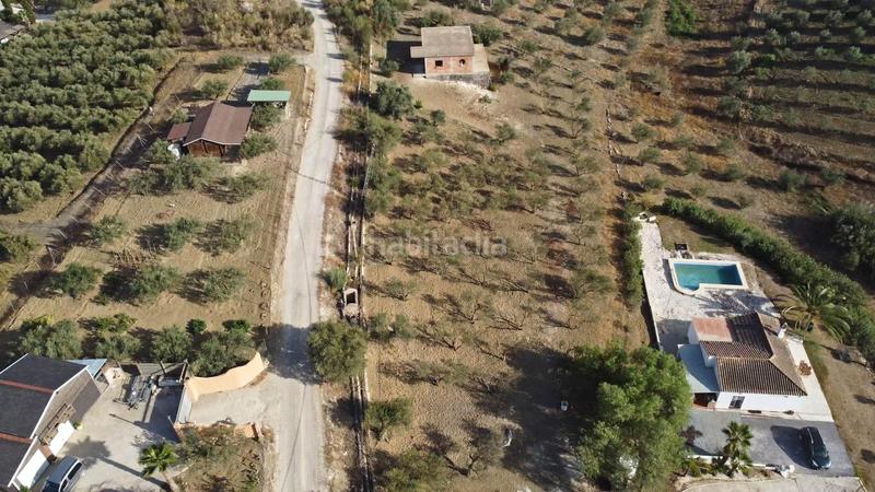 Foto 2d83e155-7f50-421c-bc7a-d5aecc13931d. Finca rústica terreno rústico de 3.750 metros, con casa de apero, olivares y edificación sin terminar. en Coín