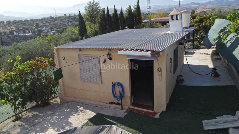 Foto cd50dfdd-4107-4a09-b554-326a45be24f1. Finca rústica terreno rústico de 3.750 metros, con casa de apero, olivares y edificación sin terminar. en Coín