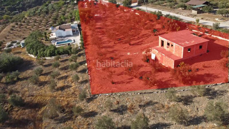 Foto fbba1fb3-86fb-428a-b4a8-0c82cf3a6dcf. Finca rústica terreno rústico de 3.750 metros, con casa de apero, olivares y edificación sin terminar. en Coín