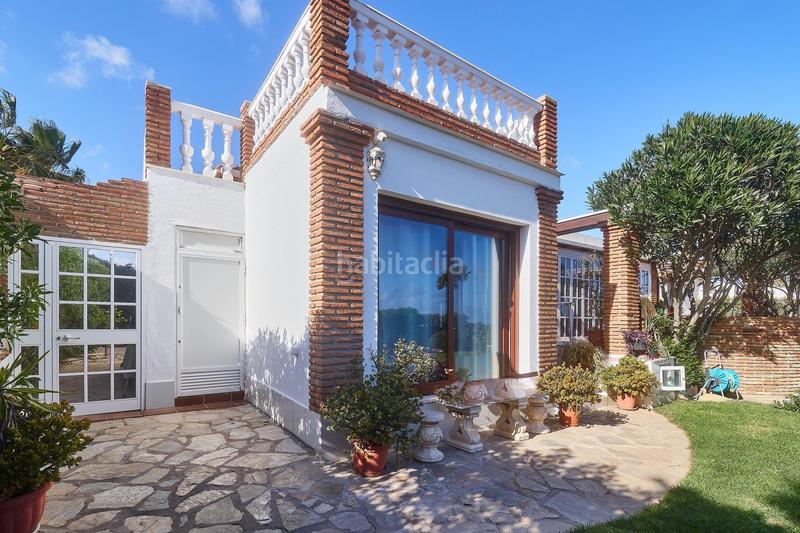 Foto 554875d3-49b0-44bb-80e3-5e2a8c0977c8. Chalet oasis andaluz espectacular villa de una planta con jardín tropical y vistas de ensueño en Mijas