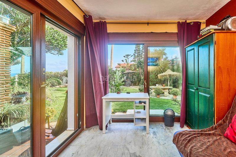 Foto 9a64f673-2e11-4881-891a-7ffcf2545424. Chalet oasis andaluz espectacular villa de una planta con jardín tropical y vistas de ensueño en Mijas