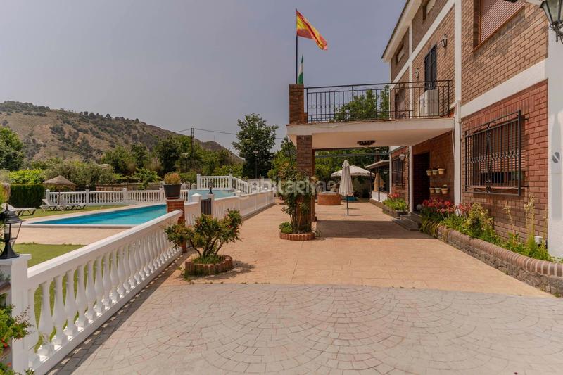 Foto 054abcf2-86d6-4ec8-932b-1417a304fb0d. Casa en Cenes de la Vega
