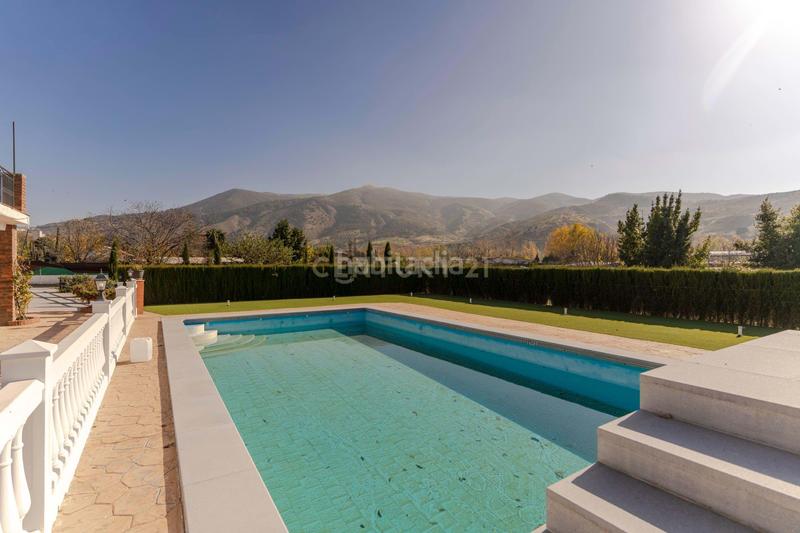 Foto bfeb4332-ab56-41a7-bac3-e063b767f50b. Casa en Cenes de la Vega
