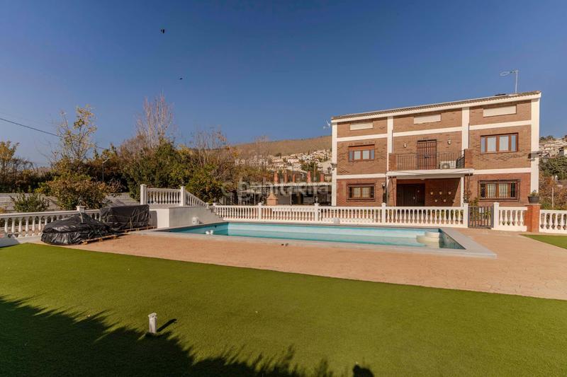 Foto c00381d3-d4ea-463a-abf8-157a63505bb3. Casa en Cenes de la Vega