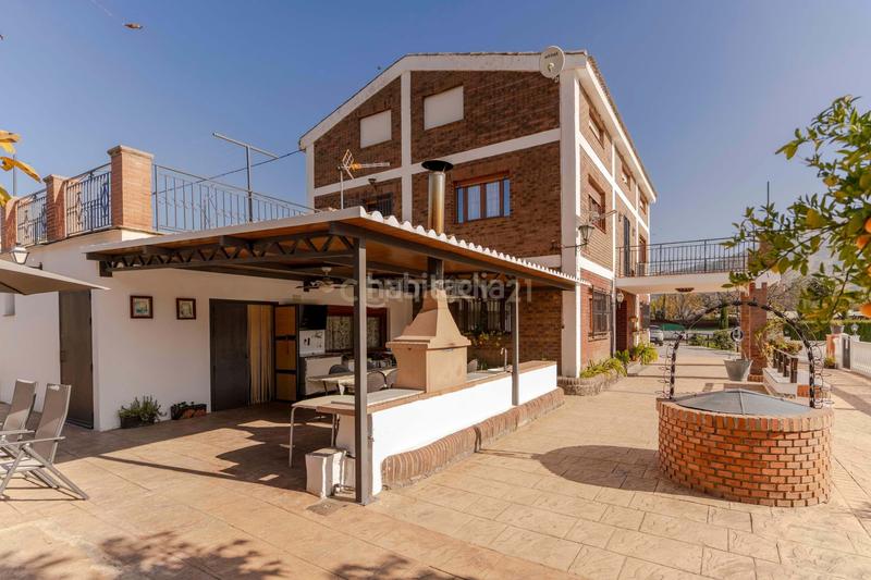 Foto d5160e6c-9b1e-4897-b939-88c75cefd49d. Casa en Cenes de la Vega