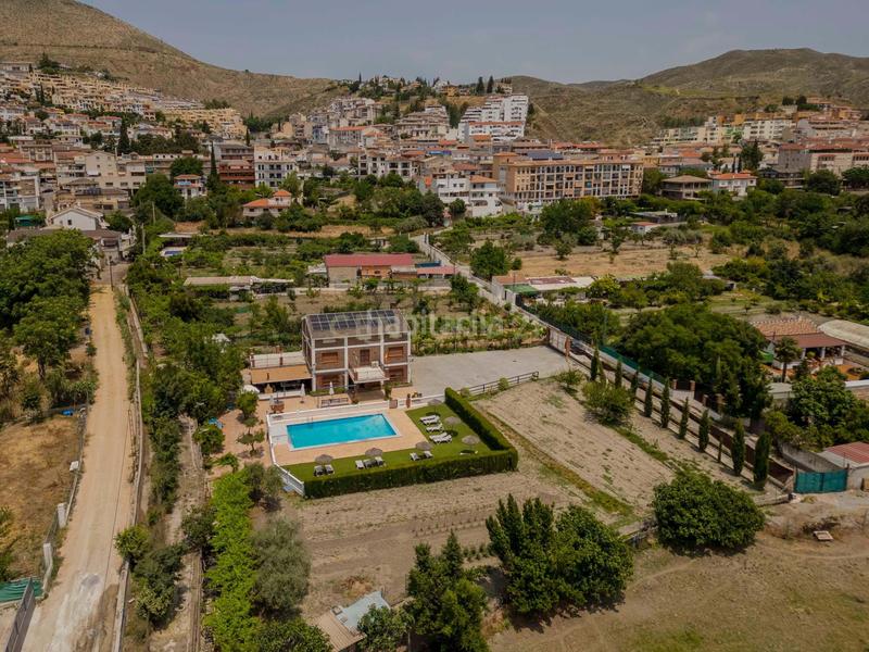 Foto dc6212b3-649f-46d2-b519-881ad0dcbe77. Casa en Cenes de la Vega