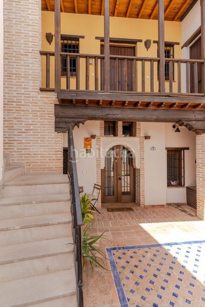 Foto 81d1885a-698e-4602-a32c-1c51e02f11e0. Piso en callejuela de san bartolomé piso reformado con encanto en el albaicín con licencia turística en Granada