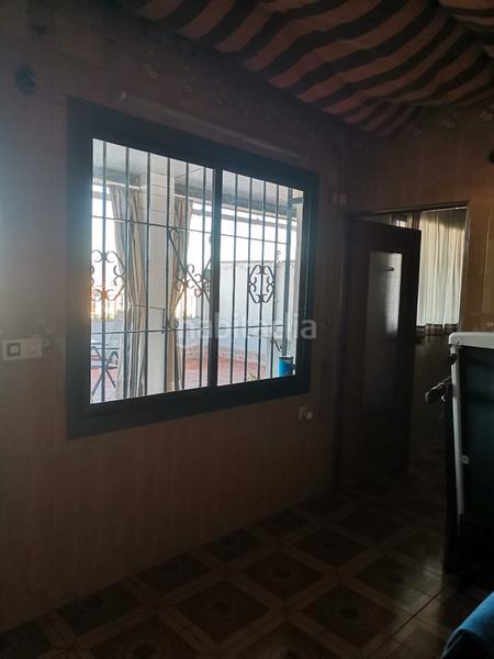 Foto 064e2a41-a1d0-41c7-8a8e-0ee8c98db6f7. Casa adossada amb xemeneia a Campo de la Verdad - Miraflores Córdoba