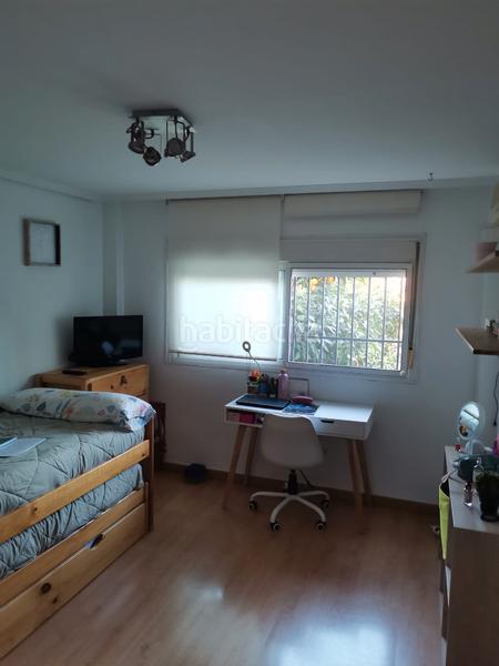 Foto bc07b704-e0db-494c-b30d-4ec97023d83a. Casa adossada amb xemeneia a Campo de la Verdad - Miraflores Córdoba