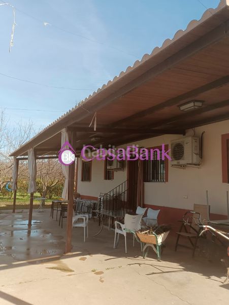 Foto 31f8958e-685b-40ec-b353-3c64d34ba5f0. Masía ref. 27778 zona la barquera. parcela no hipotecable de 3.500m2, con casa conservada y amueblada de 120m2 mas un cuarto de aperos d en Córdoba