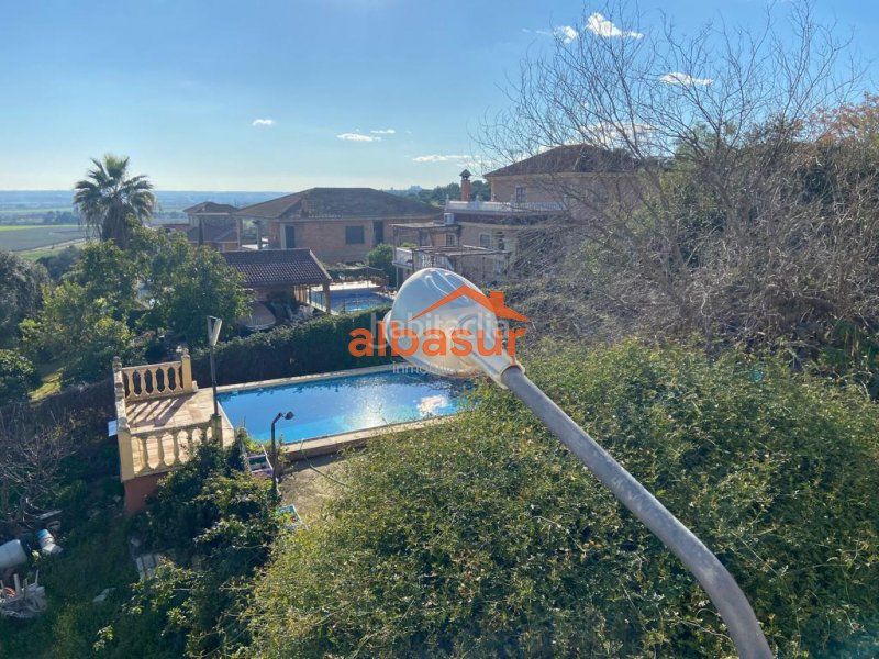 Foto 709f869d-9fea-43bf-9082-05dffd425cc4. Masia amb xemeneia calefacció piscina a Almodóvar del Río