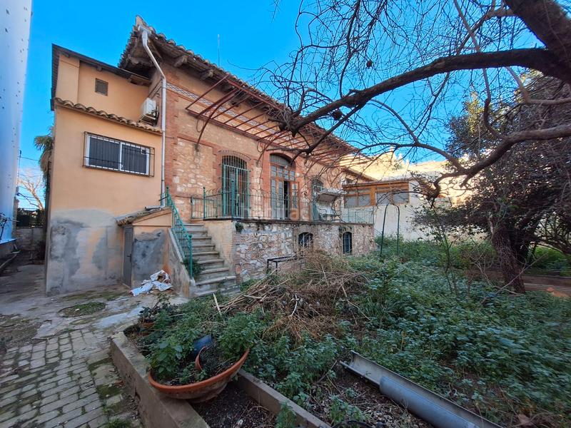 Foto 2f4e7f7e-96f8-44d9-8c05-af2862a51dc6. Chalet with fireplace in Centro Ciudad Paterna