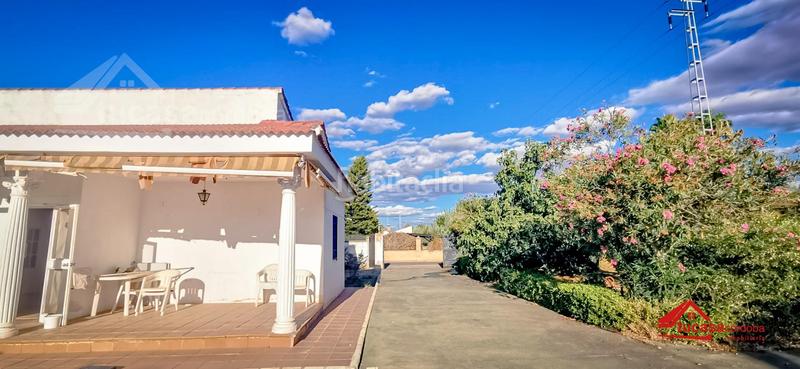 Foto 8e48964b-d06d-4ae1-bebe-8b5d6a6721a8. Casa amb calefacció aparcament piscina a El Higuerón Córdoba