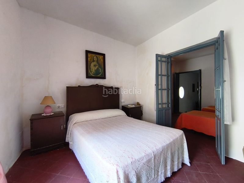 Foto 50efb823-7a47-445e-933d-bb909d91bb9b. House with fireplace parking in Cazalla de la Sierra