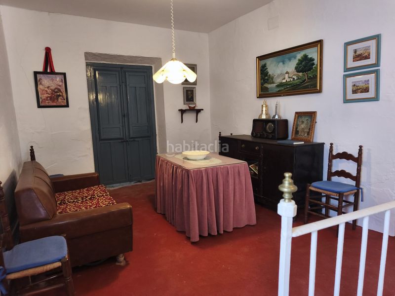 Foto 640c1d66-8f61-49d3-85a3-fbc590734d3b. House with fireplace parking in Cazalla de la Sierra