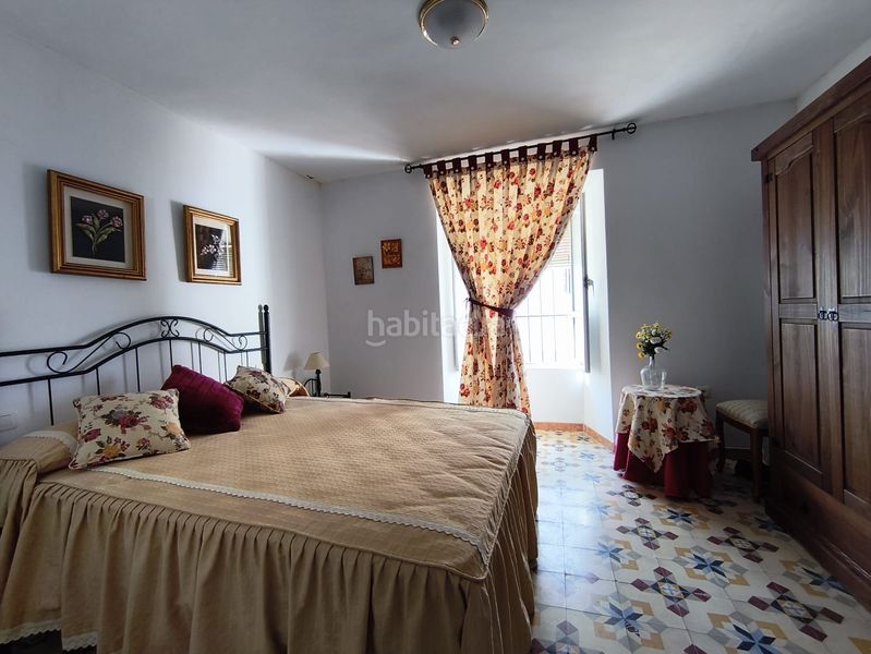 Foto f0db96b2-eaf9-43ad-9d00-b21e83d3abc8. House with fireplace parking in Cazalla de la Sierra