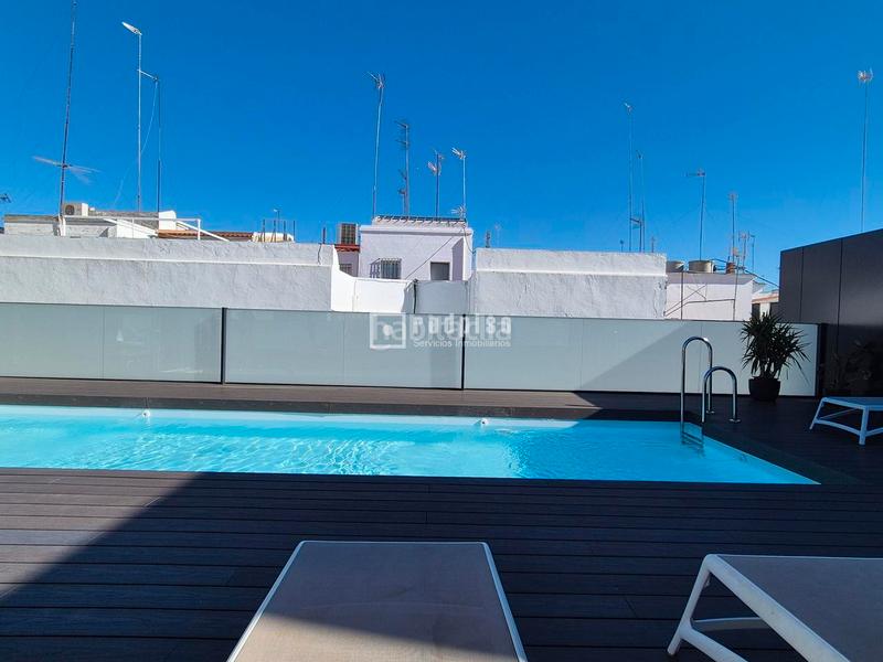 Foto 0d03e41f-7cde-4dbc-8a30-4cb26cca657f. Location appartement avec chauffage parking piscine dans Sevilla