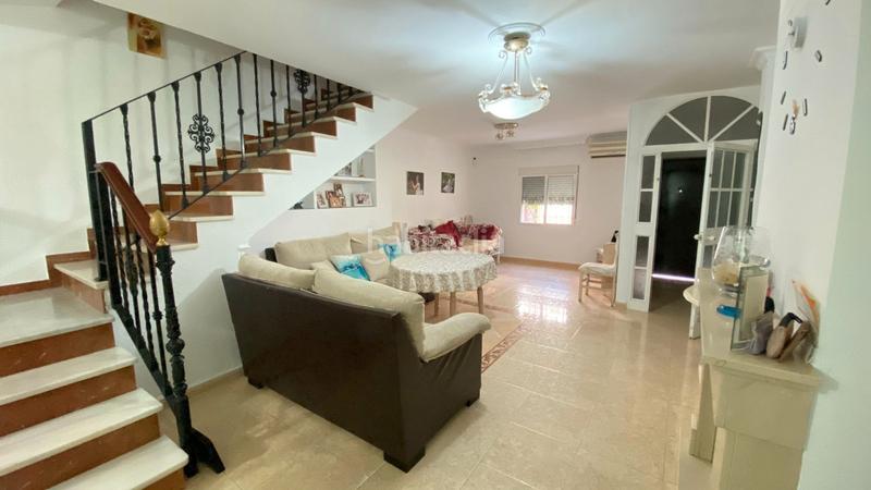 Foto 29a8a368-9d30-4969-8629-144f4f1fcd00. Casa a schiera con camino in Torreblanca Sevilla