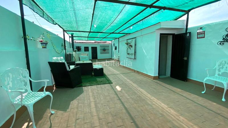 Foto 2e6238ca-6265-4a70-888c-ed5f8c32e1b9. Casa a schiera con camino in Torreblanca Sevilla