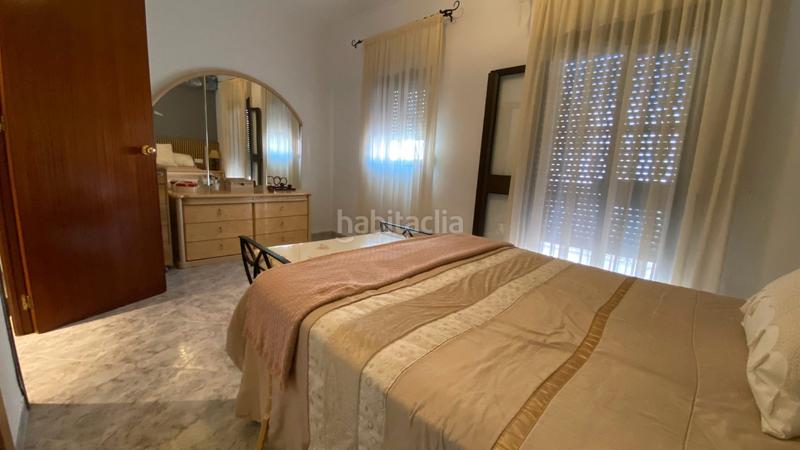 Foto 42ac33d0-c3ad-446e-93e8-78c12cc57899. Casa a schiera con camino in Torreblanca Sevilla