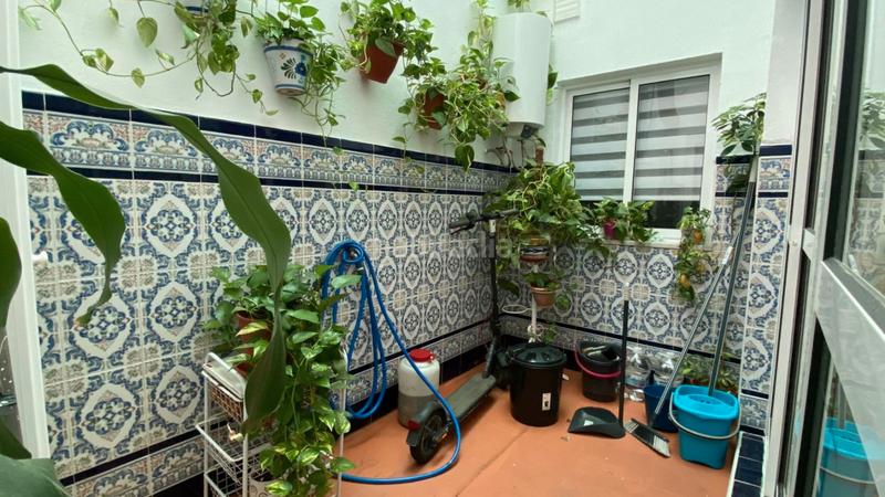 Foto b1a34c6f-42be-43f8-8d34-6df3aa267740. Casa a schiera con camino in Torreblanca Sevilla