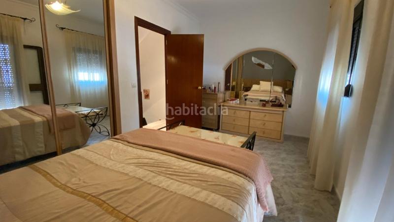 Foto d6532358-8921-487b-9b7c-28b7f5a5e7b7. Casa a schiera con camino in Torreblanca Sevilla