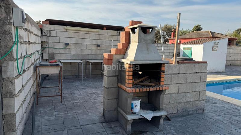 Foto 09ef5877-7f43-489a-897e-813e9da45567. Xalet amb xemeneia piscina a Carmona