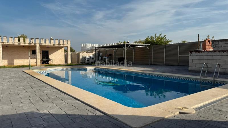 Foto 1f41dd4f-1b81-4128-aa0d-da97532c5134. Xalet amb xemeneia piscina a Carmona