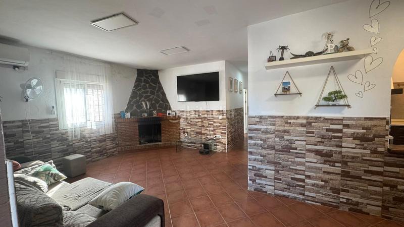 Foto 8c52cde8-9b58-40bf-aa8d-79387308ccde. Xalet amb xemeneia piscina a Carmona