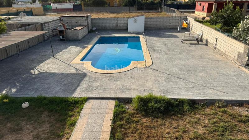 Foto d79aca2d-affe-43d0-99b6-3cb2fdce4cf5. Xalet amb xemeneia piscina a Carmona