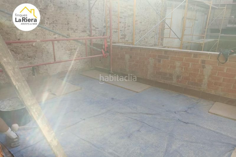 Foto bfac6c00-fc54-4972-8eaf-6a7599374d53. Planta baixa a carrer avall 31 a Centre Arenys de Mar