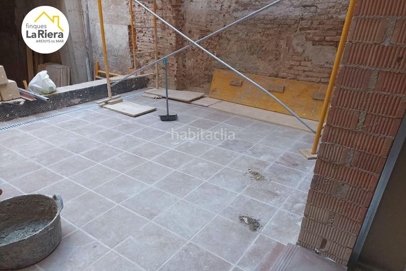 Foto fbe127ec-afc3-444a-85e7-f3b0407aed75. Planta baixa a carrer avall 31 a Centre Arenys de Mar