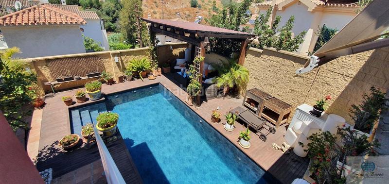 Foto 7fdf10fc-8913-4a39-8ebf-6eab6d3e1947. Chalet  en Los Pacos Fuengirola