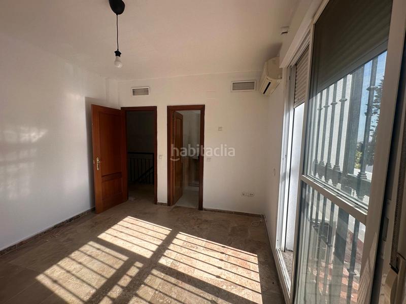 Foto 4e972eee-a174-432a-bdd5-19f12b0e088f. Casa adossada amb aparcament a Espartinas pueblo Espartinas