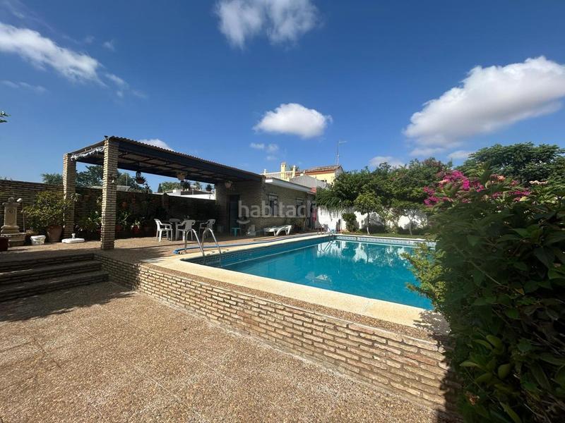 Foto 96d1cc2b-a165-4450-8ba3-92b2a40e720e. Casa amb aparcament piscina a Oromana Alcalá de Guadaira