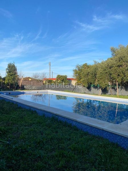 Foto d8d64560-d417-49bd-ab21-3f428e4e1ee5. Casa amb piscina a Vista Azul - Consolación Dos Hermanas