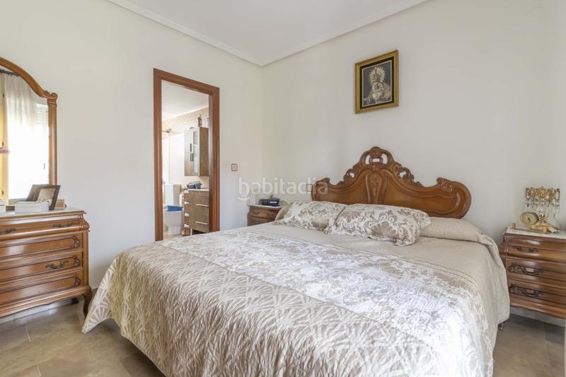 Foto f03b3c67-0972-4499-bd76-e2c07107a84f. Casa adossada amb calefacció aparcament piscina a Sevilla