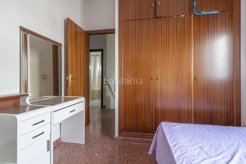 Foto fdc6f9d2-cf57-4161-8baa-f5ded9dfb7ef. Casa adossada a Palmete Sevilla