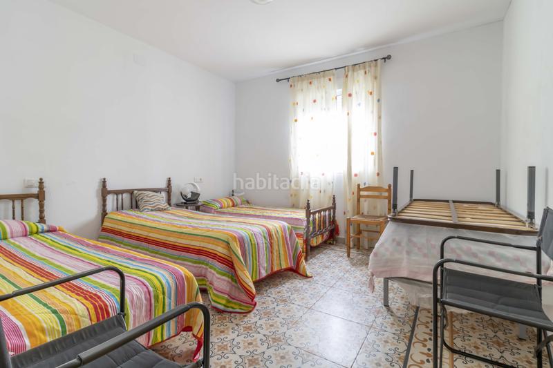 Foto d22338af-08de-4e99-8fec-890b3ab1e04d. Casa adossada a Puebla de Guzmán