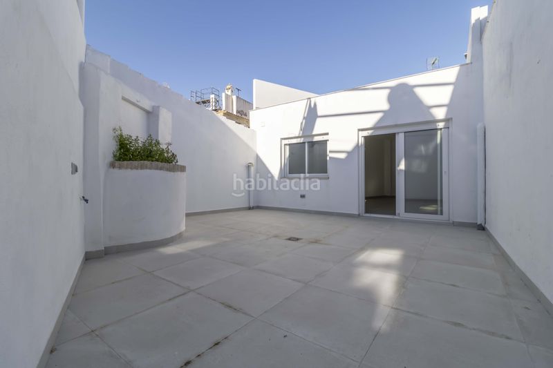 Foto 60ca7eac-5dab-42d6-8327-174a5c9e1296. Casa adossada a Salteras