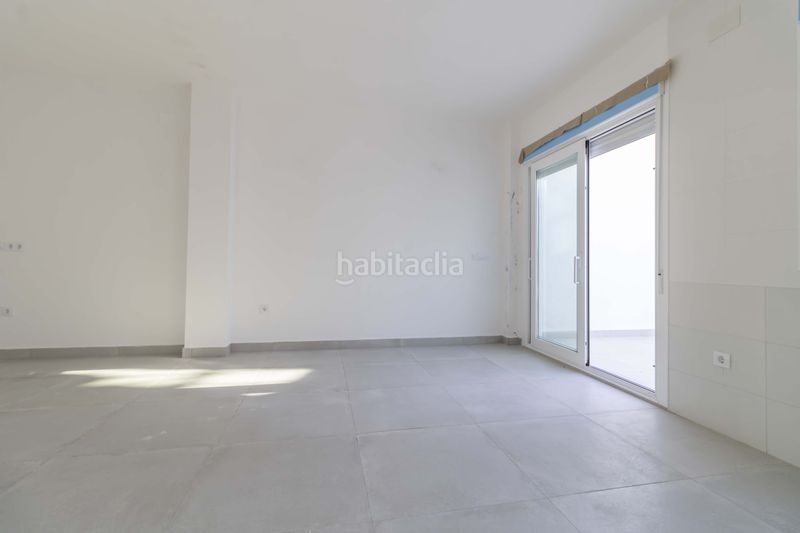 Foto f8cfd032-4525-4b50-9e93-e2f4abcc1e5b. Casa adossada a Salteras