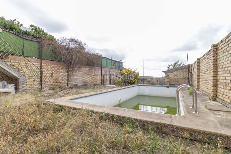 Foto 0d9904d7-7214-4d20-a9d6-2dd1c7c4f89d. Casa adossada amb aparcament piscina a Gerena