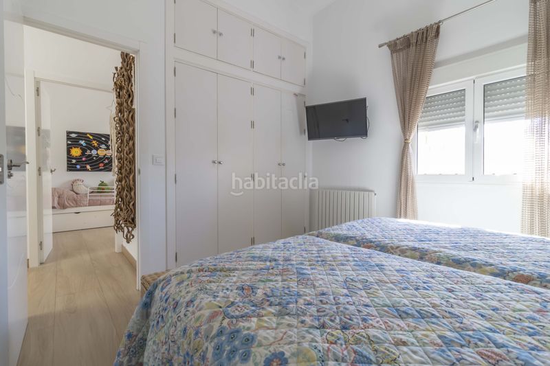 Foto ed537c00-3c7a-449a-b4ff-58397363fce0. Casa aparellada amb aparcament piscina a Ciudad Jardín Sevilla