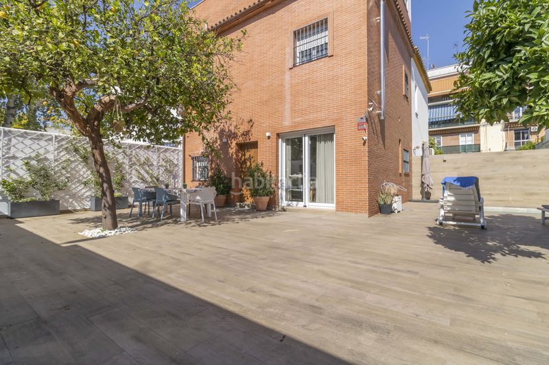 Foto fd2ccc3c-1f93-46aa-a68c-e42c6e4ba5e6. Casa aparellada amb aparcament piscina a Ciudad Jardín Sevilla