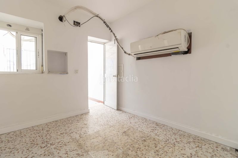 Foto e7bd8062-8353-4c7f-a96d-38d26bef05bc. Casa adossada amb aparcament a Palmete Sevilla