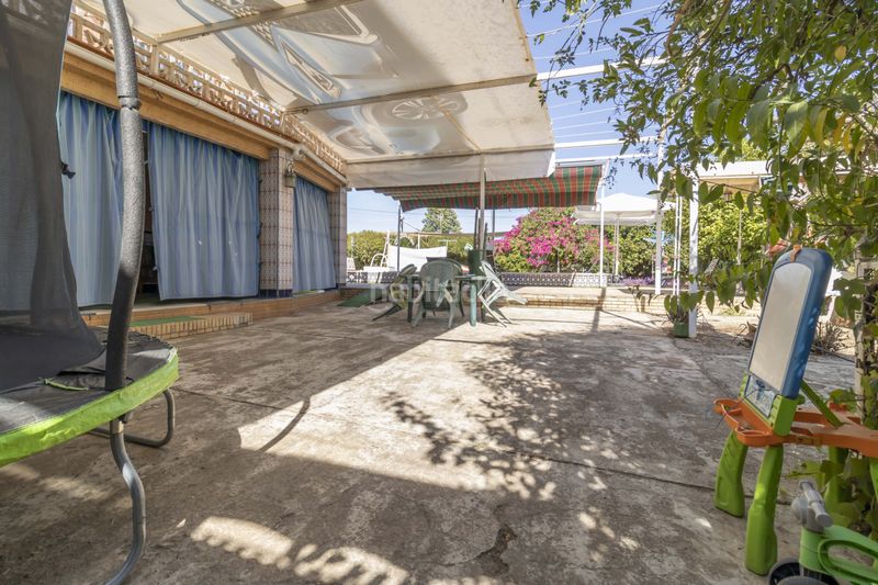 Foto ddcf8396-5e14-467a-b420-912519bdd97e. Casa amb piscina a Loreto Espartinas