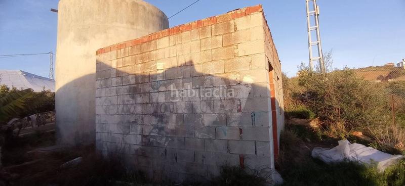 Foto 460ecd51-9ea1-4d6a-af80-f3c8b78317b2. Finca rústica parcela llana cerca del mar en Trayamar Algarrobo