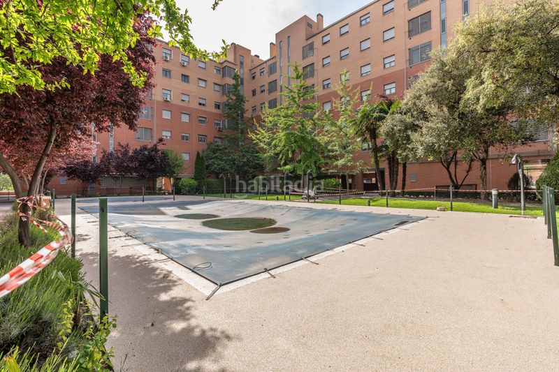 Foto cf73ae8a-9b96-43d5-8ca0-29de70b2fa2a. Pis amb calefacció aparcament piscina a Puerta Bonita Madrid