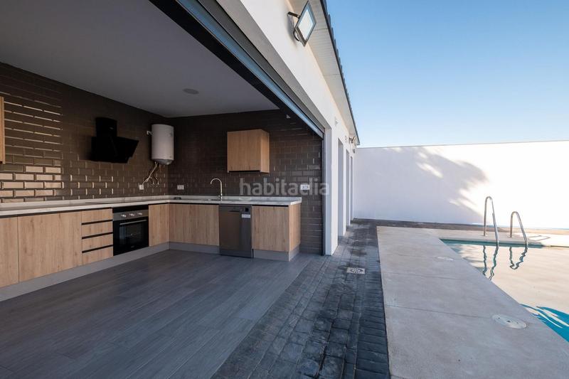 Foto 580c8706-4e9c-48e6-b0ba-807019f4cb59. Chalet con riscaldamento parcheggio piscina in Costa Esuri Ayamonte