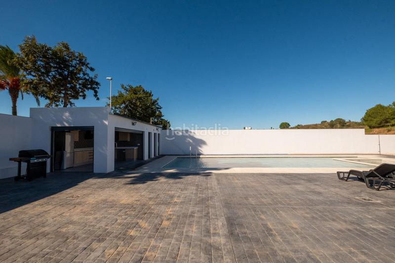 Foto 8f04cb9a-84ee-4fb2-8b24-d58d2e25d28c. Chalet con riscaldamento parcheggio piscina in Costa Esuri Ayamonte